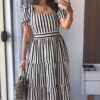 WhatsApp Image 2025-10-07 at 21.41.19 (2) Vestido longo listrado feminino em tons preto e branco