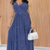 Vestido Longo Azul de Poá Feminino com Decote V e Modelagem Fluida